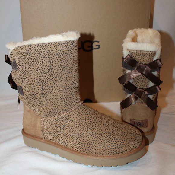 NIB UGG WOMEN'S CLASSIC SHORT CHEETAH BAILEY‎ BOW SUEDE SHEARLING BOOTS - Picture 1 of 7